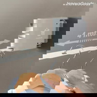 Snur de rufe retractabil, Raclox InnovaGoods, cu orificii pentru umerase, 4 m, InnovaGoods