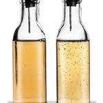 Set 2 butelii pentru ulei si otet Orion, cu dozatoare si suport din lemn de pin, transparent, 300ml