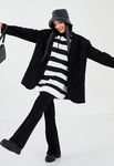 Pantaloni kick-flare