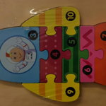 Puzzle Racheta, 10 piese din lemn, multicolor, Montessori, + 3 ani