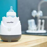 Incalzitor pentru biberoane (recipiente) Warmer Tulip Cream, BABYMOOV