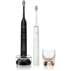 Philips Set de doua periute sonice Diamond 4 moduri de periere 3 intensitati 1 suport 1 pahar alb/negru/auriu Philips Set de doua periute sonice Diamond 4 moduri de periere 3 intensitati 1 suport 1 pahar alb/negru/auriu