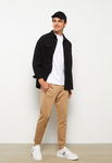 Pantaloni sport cu snur si buzunare cu fermoar