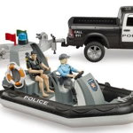 Masinuta Bruder - Police Dodge Ram 2500, cu remorca si barca, cu lumini si sunete, 1:16